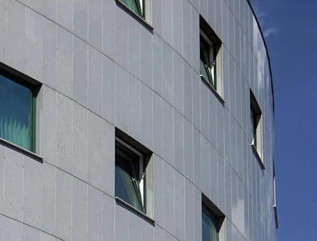 Can aluminum veneer be used to make a building's exterior waterproof?